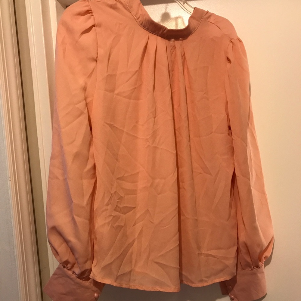 Pale orange blouse